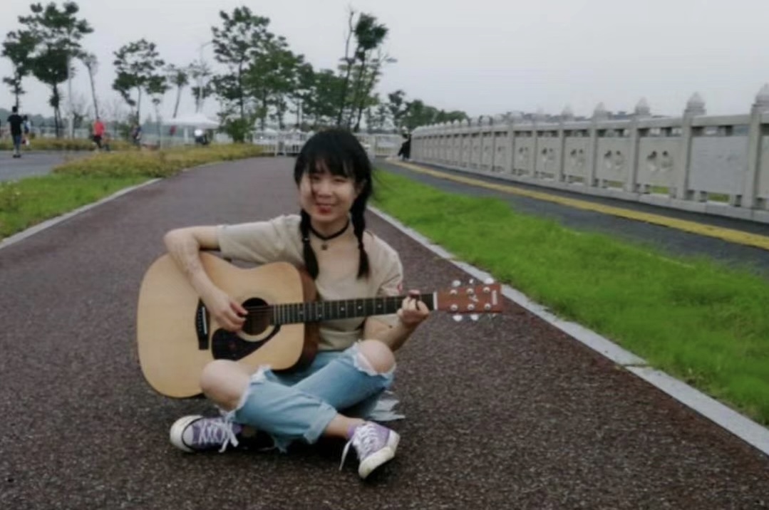 Playing guitar